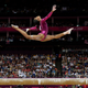 Image for article titled Gabby Douglas's Beam Performance Gives Us The Defining Photo Of The London Olympics